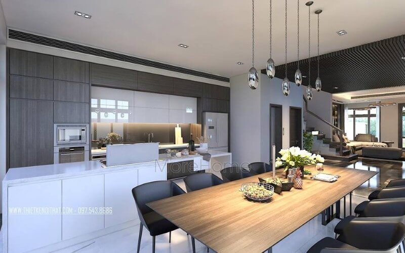 Bố trí nội thất phòng ăn liền bếp hiện đại, đẹp từ tủ bếp đảo kết hợp đá ốp cao cấp cùng bộ bàn ghế ăn gỗ nguyên tấm độc đáo.